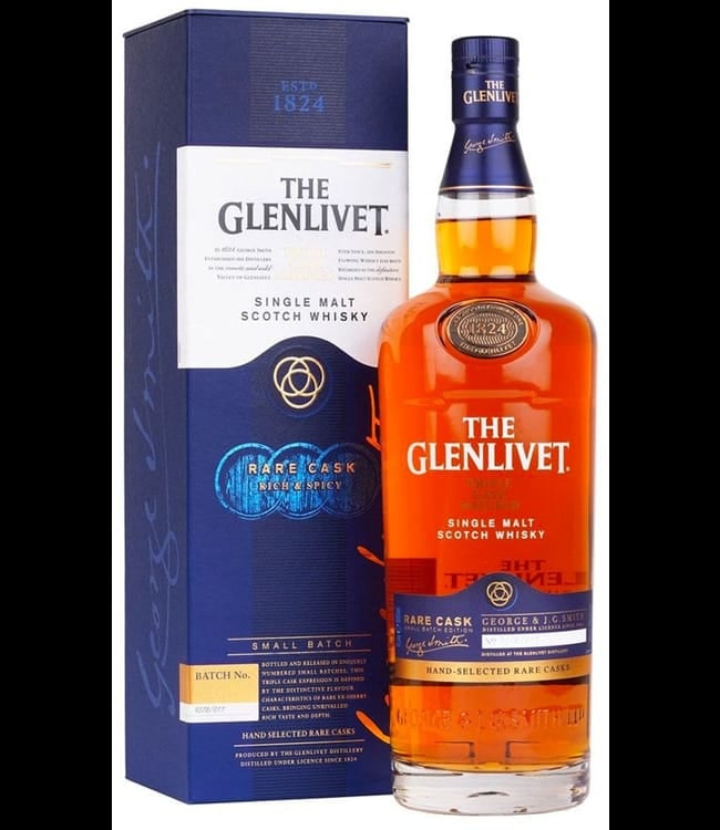 The Glenlivet Single Malt Scotch Whisky bottle with its navy blue gift box packaging displayed side by side