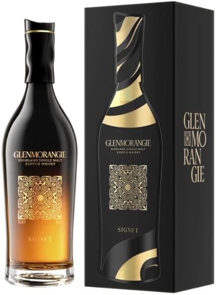 Glenmorangie Signet single malt Scotch whisky bottle displayed next to its black and gold luxury packaging box