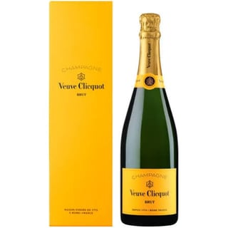Veuve Clicquot Brut champagne bottle next to its yellow branded gift box