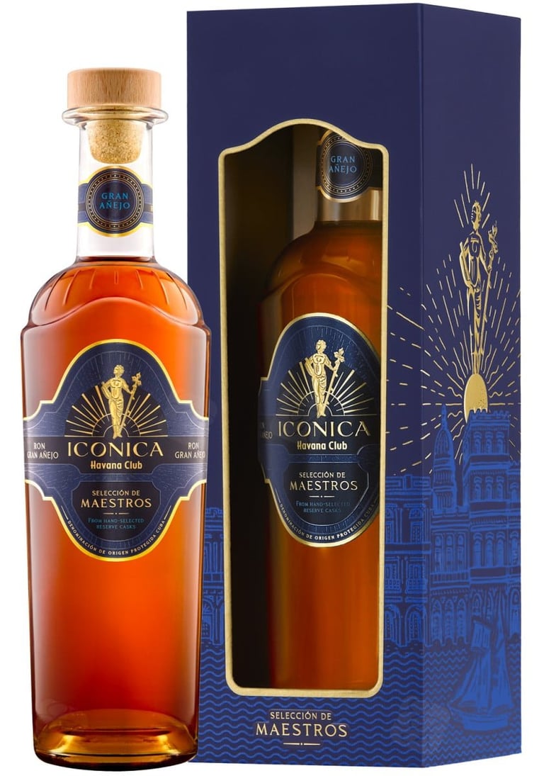 Iconica Havana Club Seleccion de Maestros rum bottle with gold label next to its dark blue gift box packaging