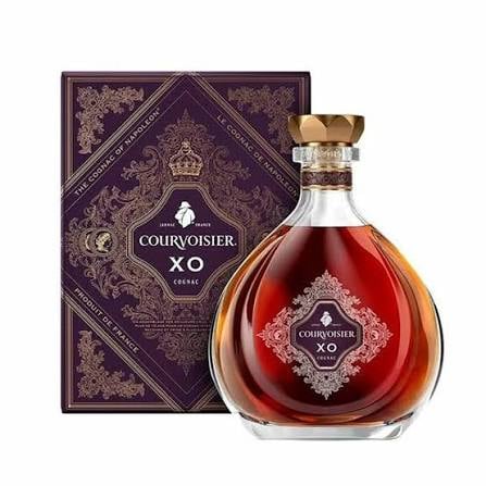 Courvoisier XO Cognac bottle with ornate purple box packaging featuring gold decorative patterns and emblem