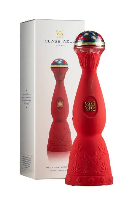 Clase Azul Mexico tequila bottle set in red glass with iridescent dome top and original packaging box