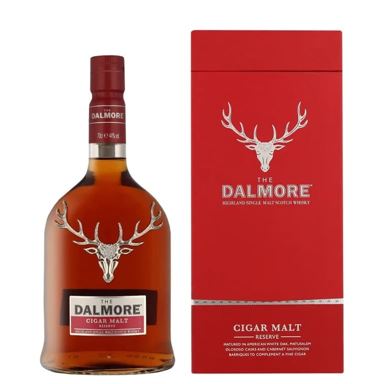 Dalmore Cigar Malt scotch whisky bottle next to its red branded gift box with white deer antlers logo