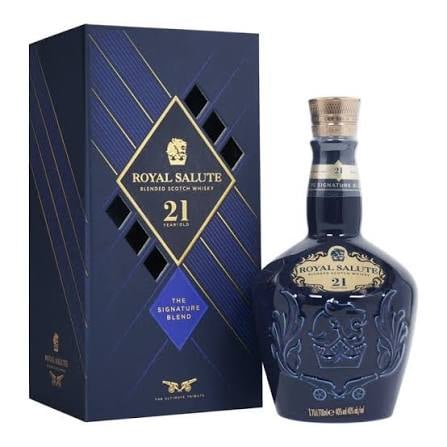 Royal Salute 21 Year Old blended scotch whisky bottle next to its dark blue gift box