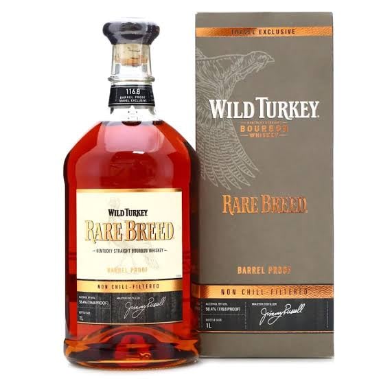 Wild Turkey Rare Breed bourbon whiskey bottle with matching box packaging, showing amber liquid and ornate label design