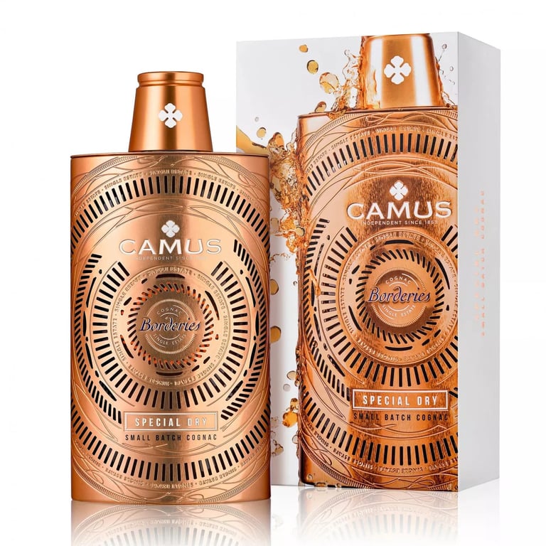 Camus Special cognac bottle with ornate gold design next to its retail box packaging
