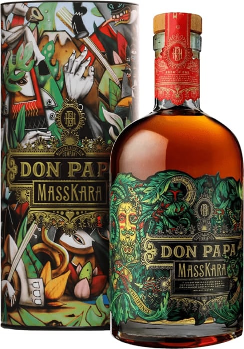 Don Papa Masskara rum bottle and colorful cylindrical gift box with ornate skull and carnival-themed artwork
