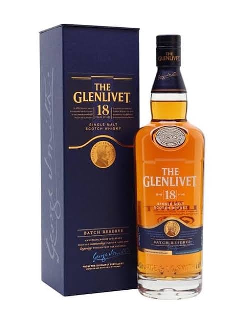 The Glenlivet 18 Year Old Single Malt Scotch Whisky bottle with its dark blue branded box packaging