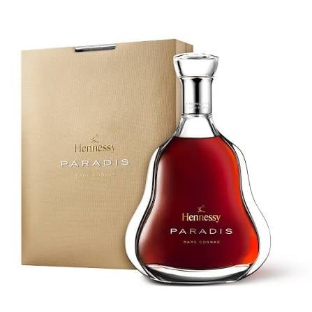 Hennessy Paradis rare cognac bottle with gold gift box on white background