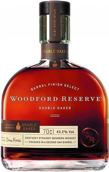 Bottle of Woodford Reserve Double Oaked Kentucky bourbon whiskey with dark label against white background